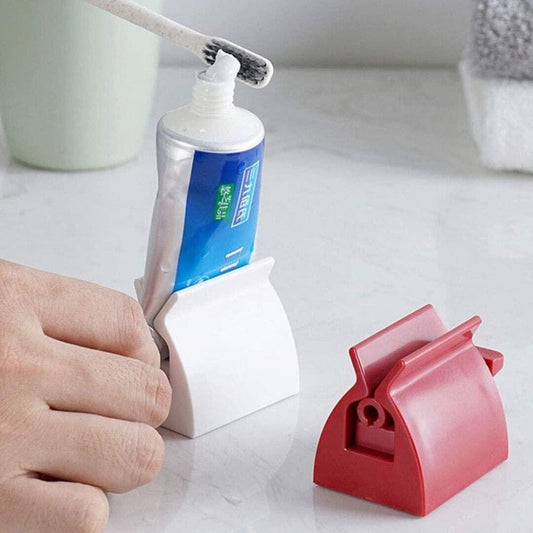 EXPRIMIDOR DE PASTA DENTAL Y CREMAS